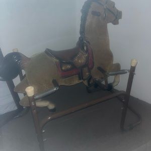 Great rocking horse 25.00 is my price and if picked up locally 20.00.
